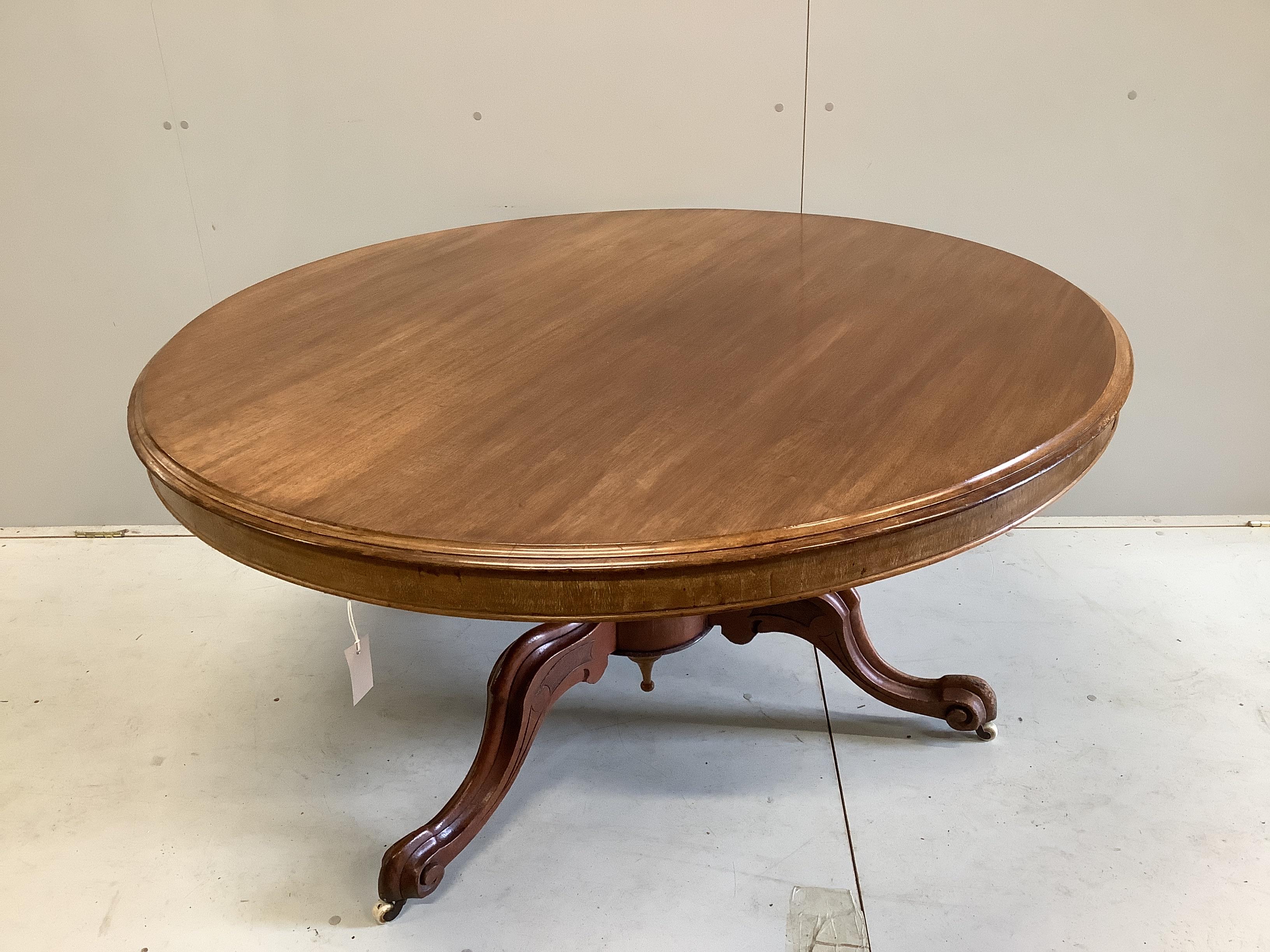 A Victorian circular mahogany tilt top breakfast table, diameter 134cm, height 71cm, together with a harlequin set of six balloon back dining chairs